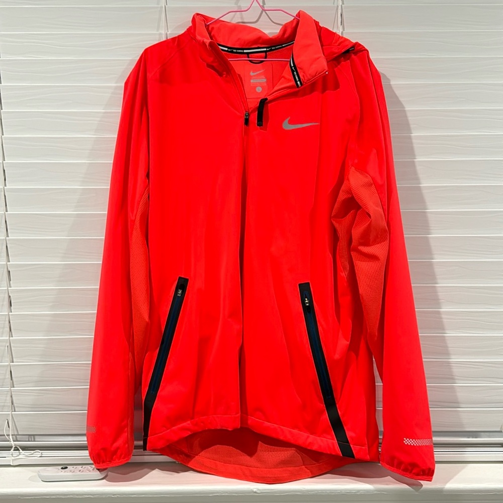 Nike running jacket with hood.